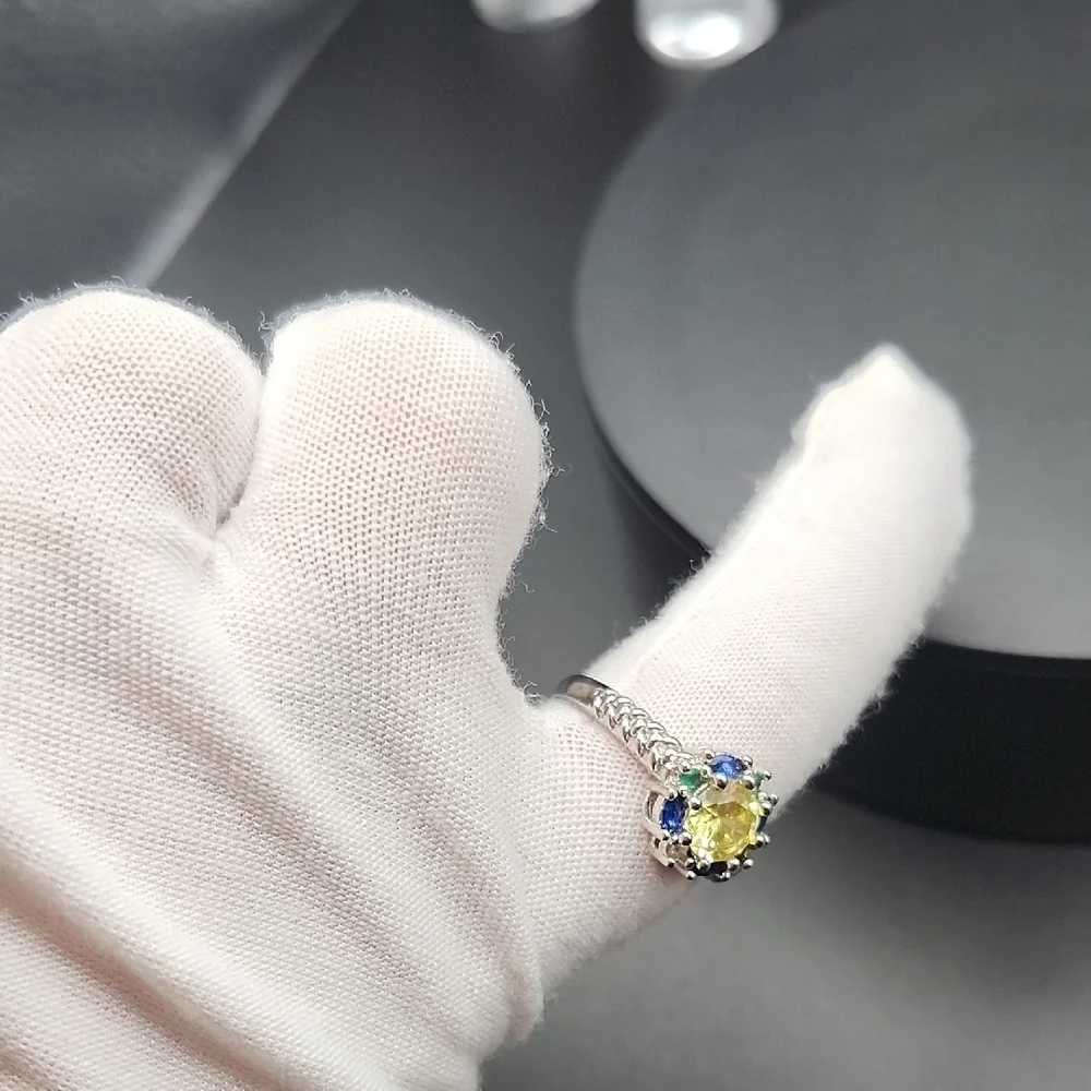 Elegant Silver Ring with Yellow and Blue Stones
